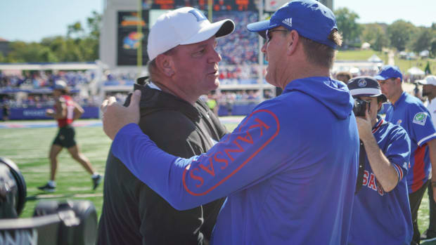 Sep 24, 2022; Lawrence, Kansas, USA; Duke Blue Devils head coach Mike Elko talks with Kansas Jayhawks head coach Lance Leipold on field after the game at David Booth Kansas Memorial Stadium. Mandatory Credit: Denny Medley-USA TODAY Sports